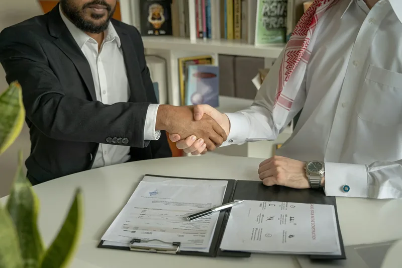 A handshake over signed documents