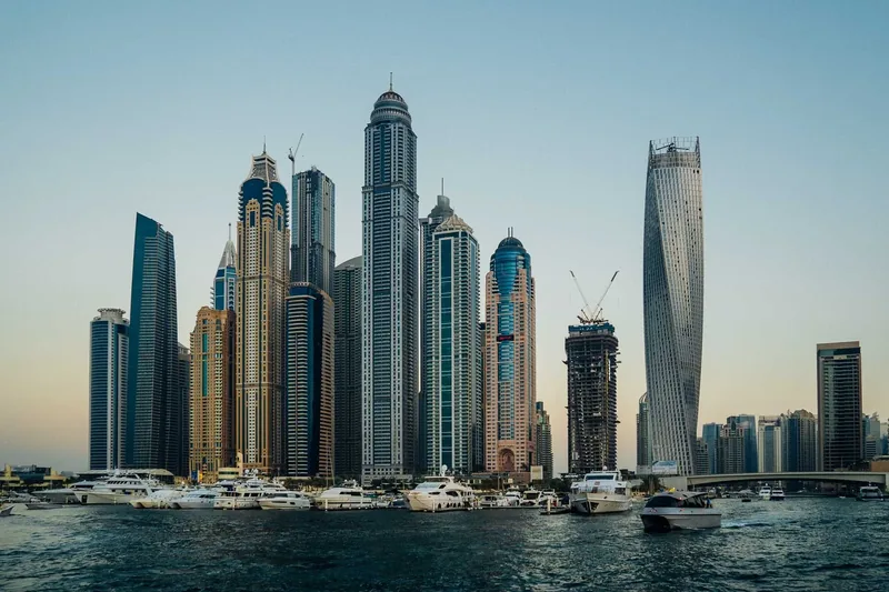 Towers on the Dubai Marina waterfront at dusk